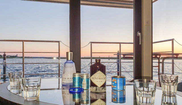 Enjoy a vacation on the water in this inviting houseboat in Lelystad.