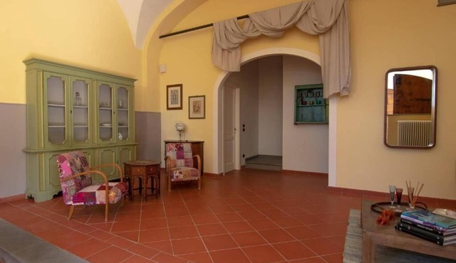 Exclusive house nestled in the Tuscan countryside, between Florence and Pisa, with swimming pool.