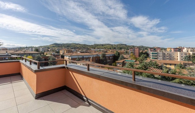 GuestHost - Bright and modern penthouse able of hosting up to 3 people, which boasts a large terrace with an unparalleled view of the Bolognese hills. The accommodation is located in a quiet residential area with low car traffic, near the Bellaria hospit