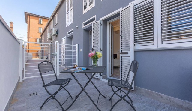 GuestHost - Cozy apartment equipped with all comforts to accommodate up to 3 people, including an outdoor patio where you can enjoy pleasant moments of relaxation. The accommodation is located in the Borgo Panigale district, a very quiet residential area