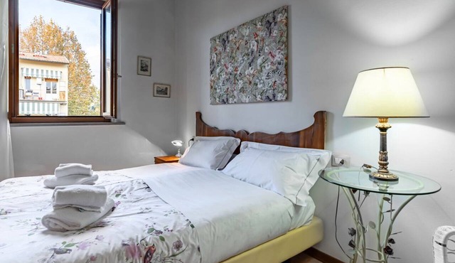 GuestHost - Cozy apartment of about 45 sqm, for up to 4 people, located on the 2nd floor with lift (NOT suitable for disabled people; some steps at the entrance) of a renovated ancient building. The apartment is located in the Piazza Ferrucci/Ponte San N