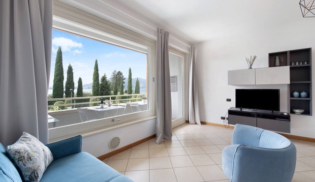 Holiday Apartment "Residence Perlago Fiordaliso" with Lake View, Shared Terrace & Wi-Fi