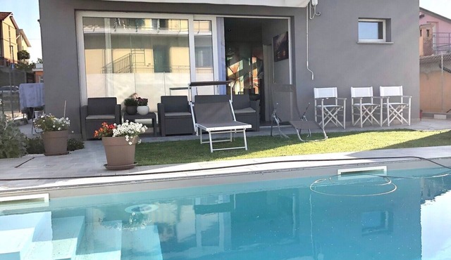 Holiday Home 'Chalet Al Mare' with Private Pool, Garden, and Air Conditioning