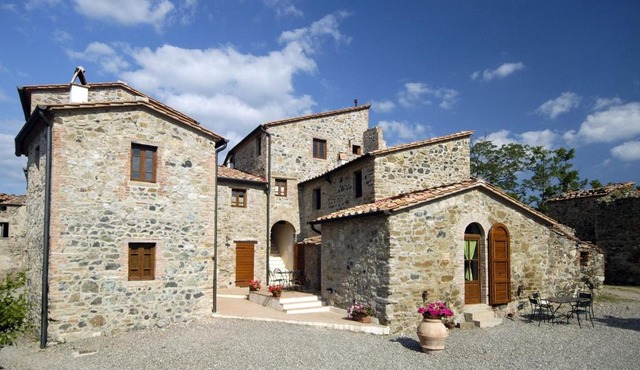 In a wonderful medieval village on the Tuscan hills, with air conditioning