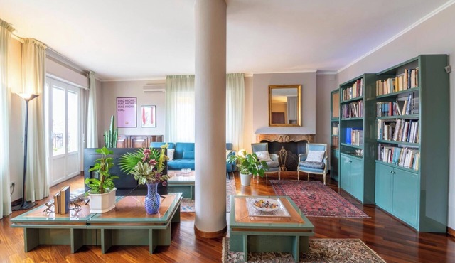 Large and bright penthouse in the heart of the city of Parma near the station