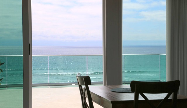 Large beachfront loft apartment in gated community Playa La Misión with deck.