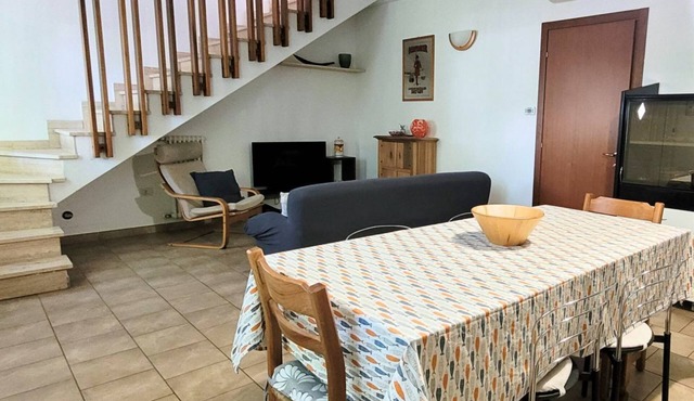 Location: in the central area, a few steps from the sea and all services.Description: very central four-room apartment on two floors connected by stairs.1st floor: large living room with sofa, table, kitchenette and dishwasher - bedroom with double bed -