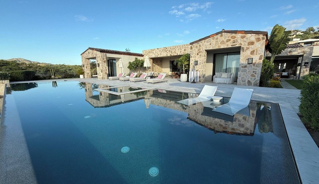 Luxury 4-bedroom spacious home with pool, fitness, ocean views and privacy.