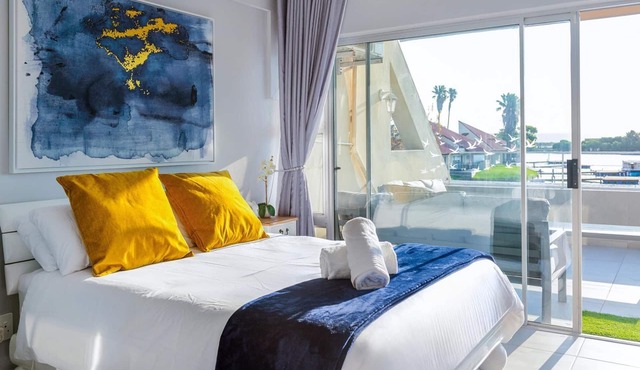 Luxury Riverside Getaway | Balcony | Pool
