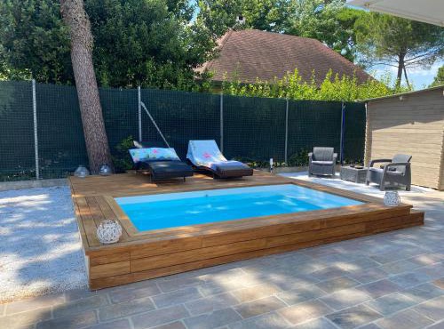 MIMA61 - Appartamento con piscina, giardino e posti auto a 50mt dal centro
