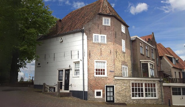 Monumental Dutch house in old center on harbor. Unique and luxurious location!