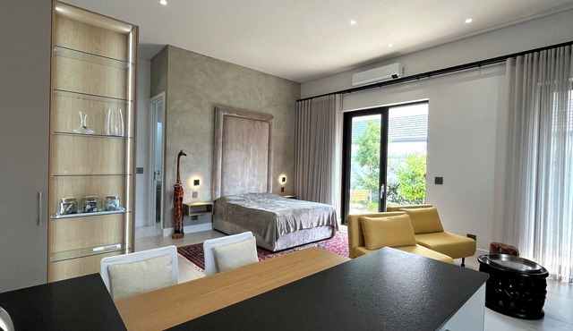 New guest apartment with small garden/terrace, private access and parking space