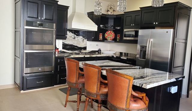 Pristine 3-bed, 3.5-bath villa with mountain, golf course, sea views & hot tub