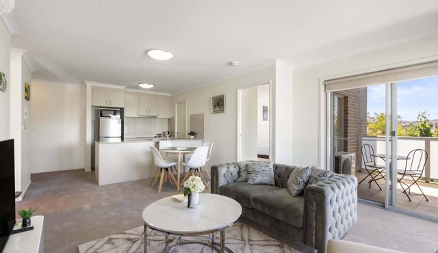 Relaxed 2BR, 2BTH Apartment with Balcony & Parking