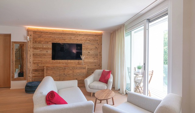 Residenza Edelweiss 5.3 – Penthouse with mezzanine, fireplace and stunning view