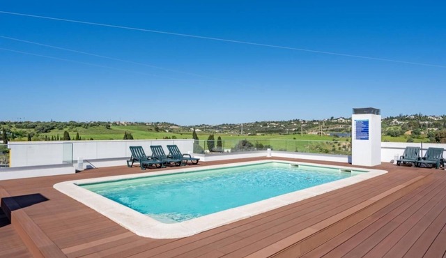 Rooftop pool, balcony and AC
