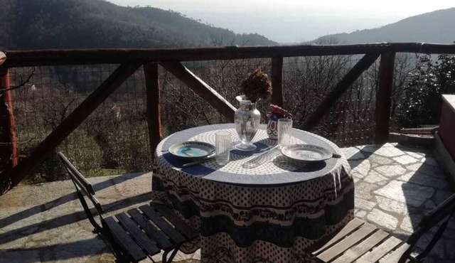 Rustic country house in the middle of nature with a view of the sea