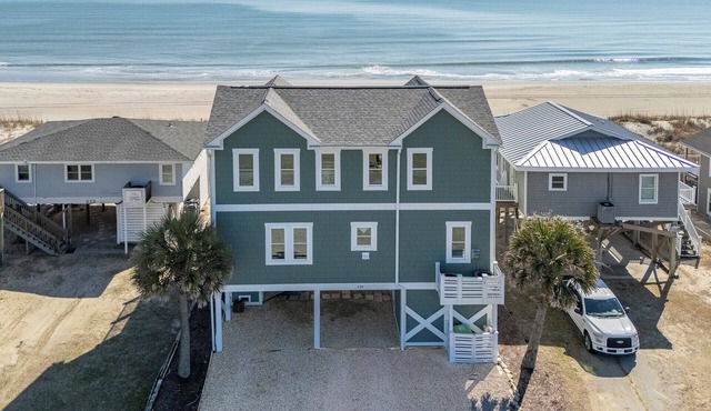 Seaside Luxury at "East Palm Beach" Oceanfront Oasis with Elevator and Dual Living Spaces!