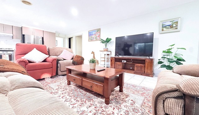 Spacious 4BR Family Retreat with Cozy Lounge