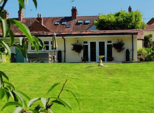 The Nook located in a beautiful garden setting with parking