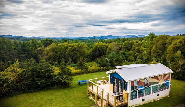 Tiny, charming mountaintop cottage with large firepit, deck and amazing views