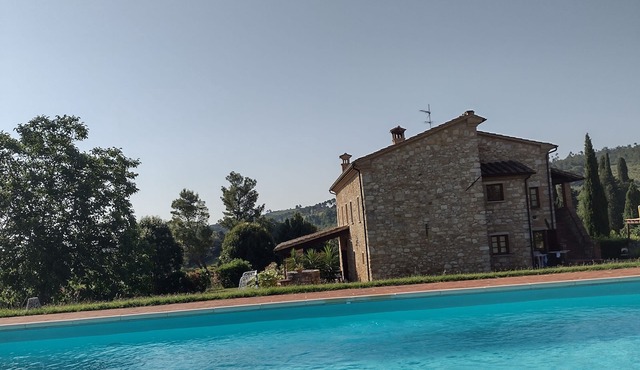 Tuscan-style villa with private pool and 2500 acres of garden and land.