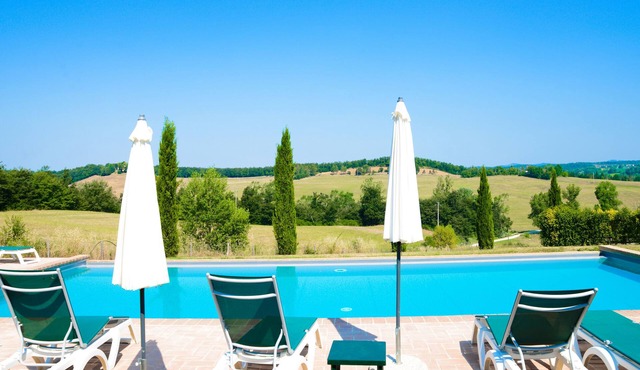 Tuscan village in SIena. farmhouse surrounded by garden,pool and panoramic view