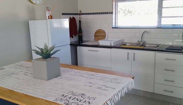 Unit Elaine, a spacious 1-bedroom apartment in serene Brackenfell, free WiFi.