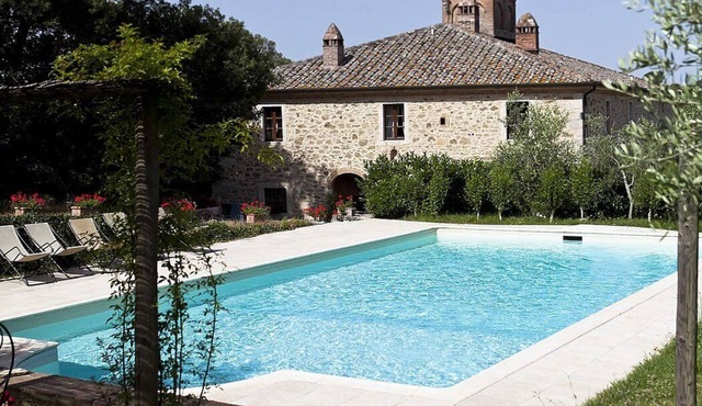 Villa Adalia: An elegant and welcoming apartment that covers the entire top floor of an ancient country manor built on a hillside, surrounded by meadows and woods.