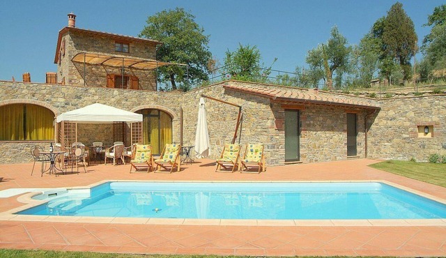 Villa Eracle: A bright and elegant three-story villa surrounded by vineyards and olive groves.