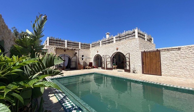 Villa in Ghazoua with heated pool and janitor