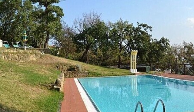 Villa Mariolina Grande: A characteristic and welcoming two-story age-old farm house located in an isolated position, on the slopes of a hill which is covered with olive groves, with Free WI-FI.