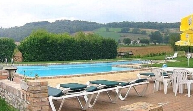 Villa Pavone A: A welcoming two-story apartment that is part of a villa surrounded by the greenery, with Free WI-FI.