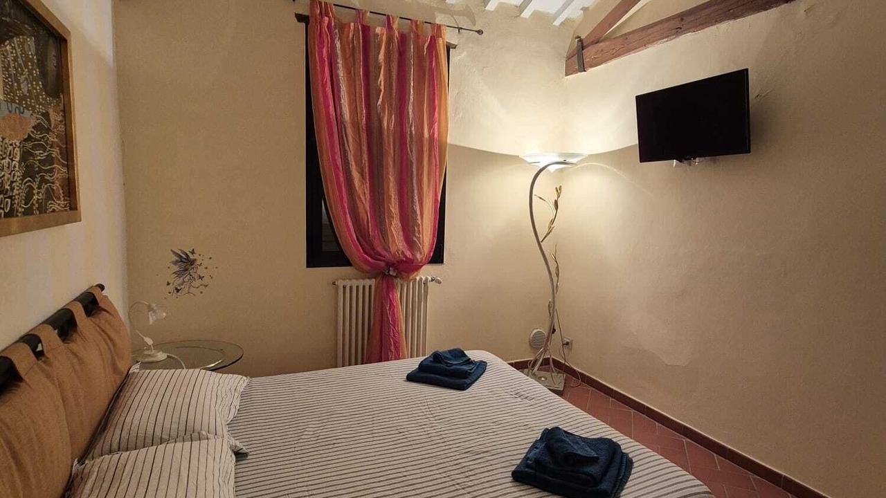 Photo of Bedroom in Osteria delle Noci
