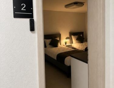 Standard Twin Room with Shared Bathroom