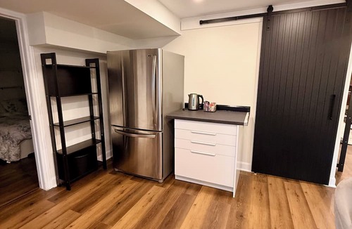 Aurora House | Bright Walk-Out Suite with Private Entrance, Parking & Backyard …